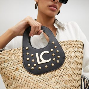 Capazo con detalles en efecto piel y tachuelas Negro Lola Casademunt